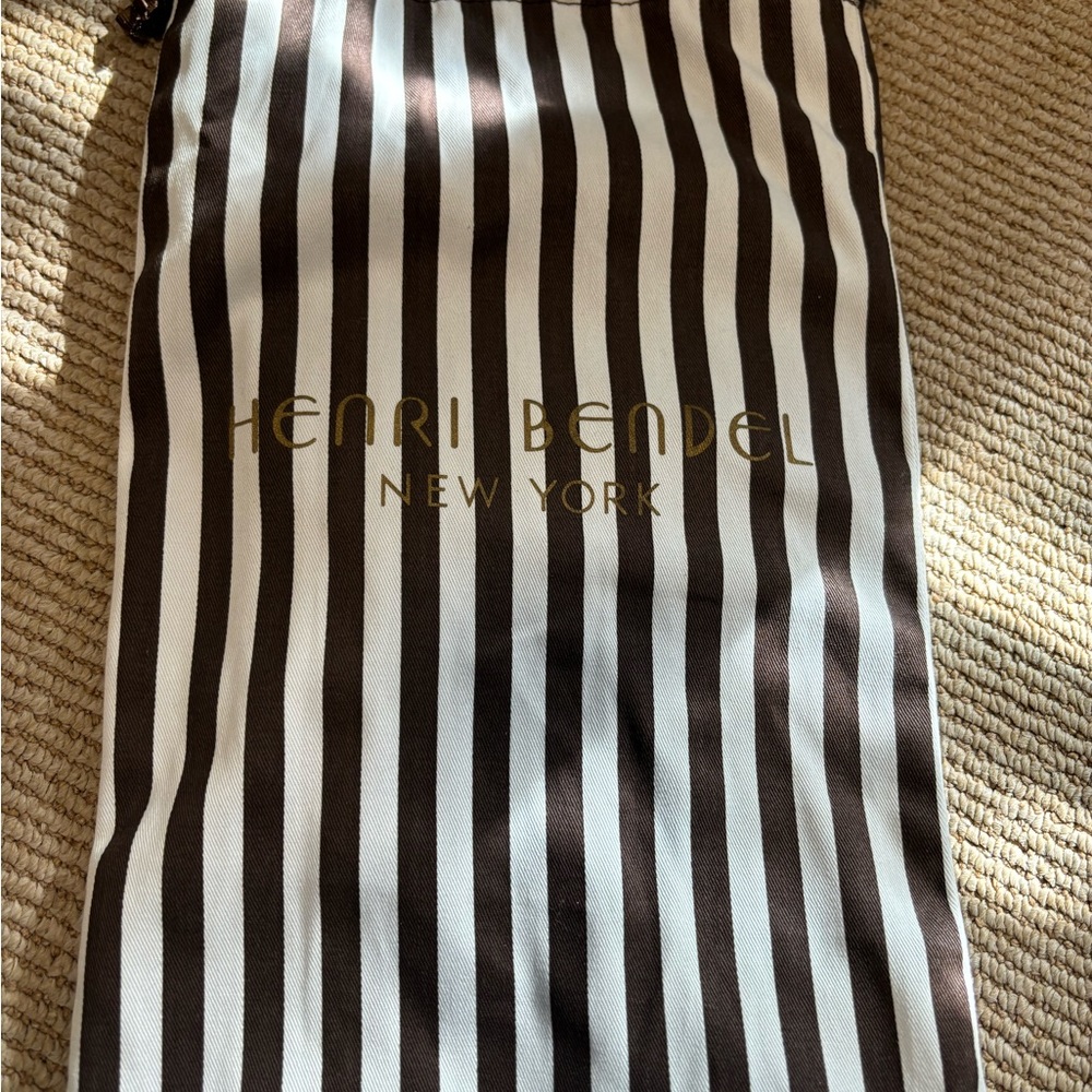 Henri Bendel envelope clutch with back pockets